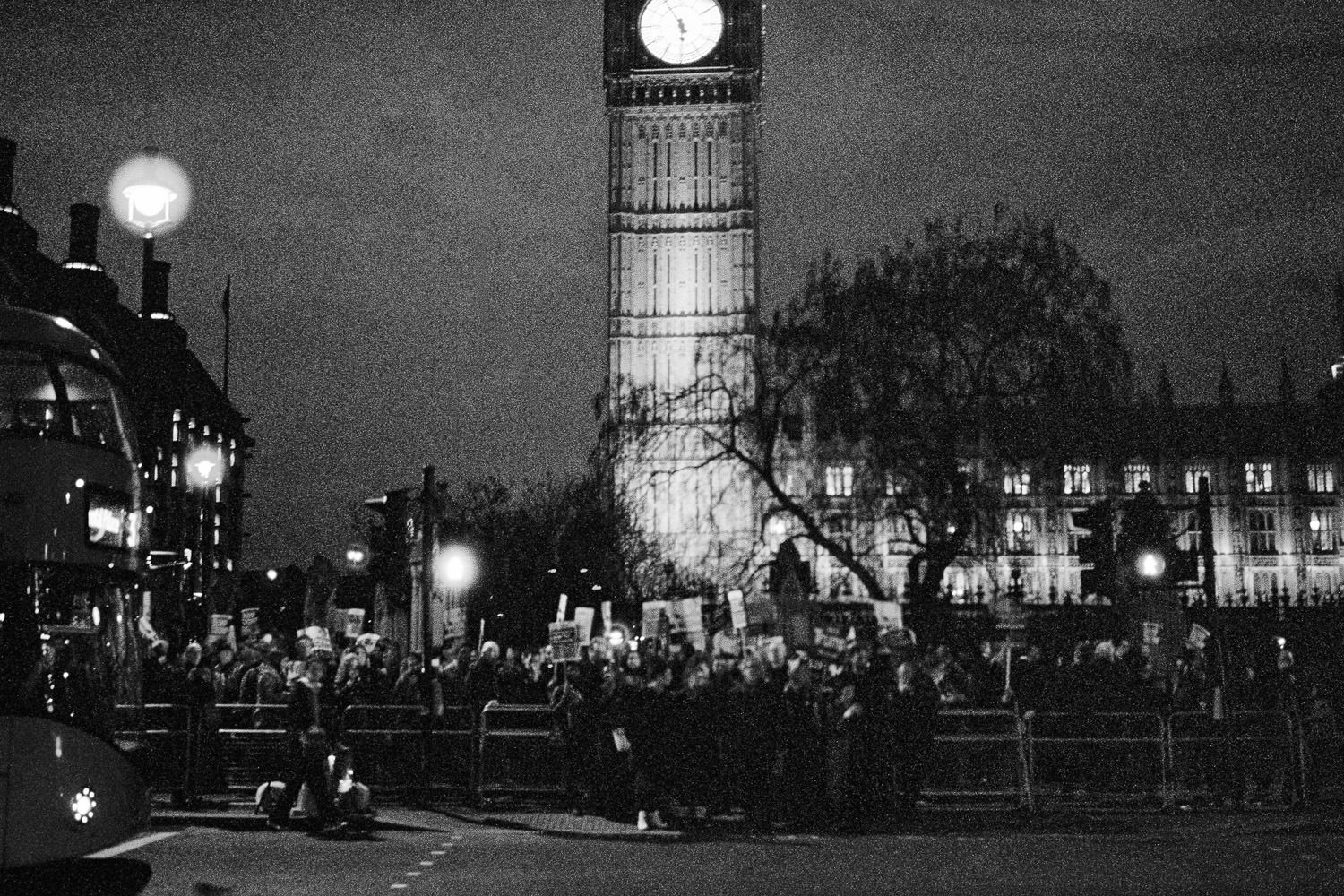 protestors at Trump march crossing road with Big Ben behind