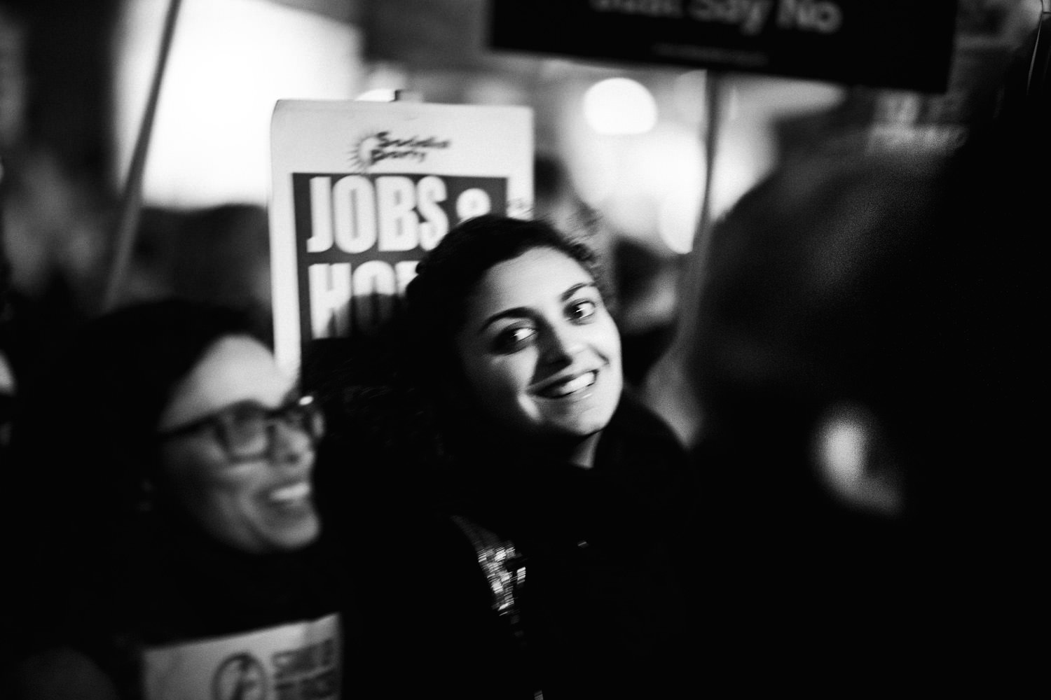 woman smiling at protest