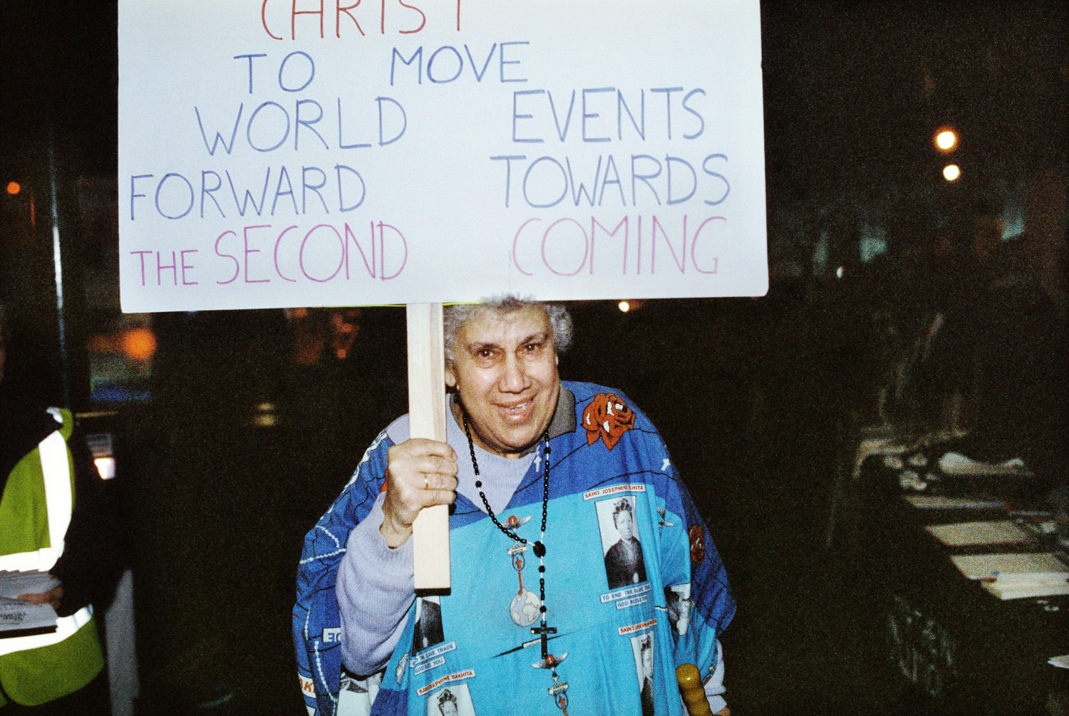 nun holding placard