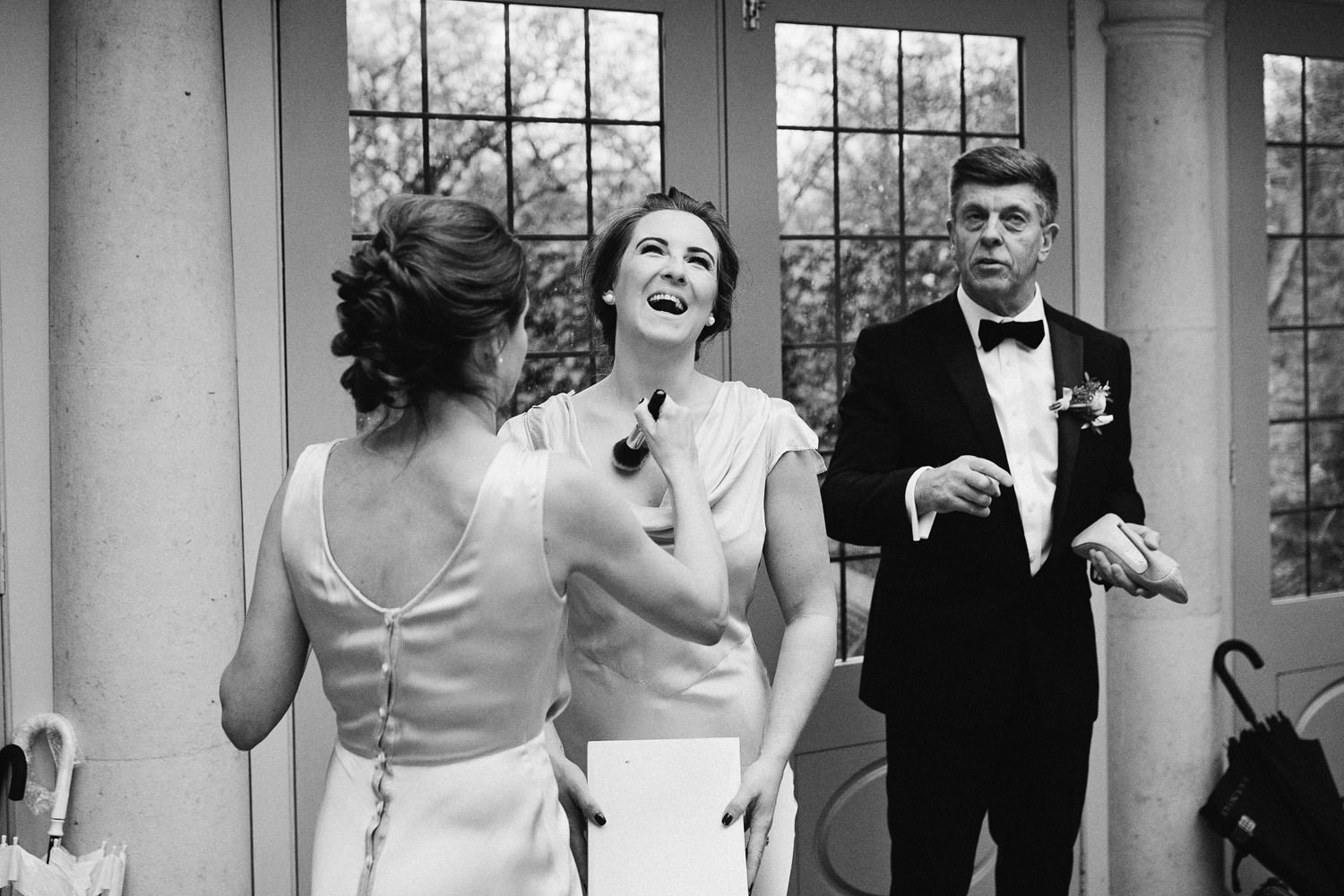 bridesmaid laughing at Barnsley house