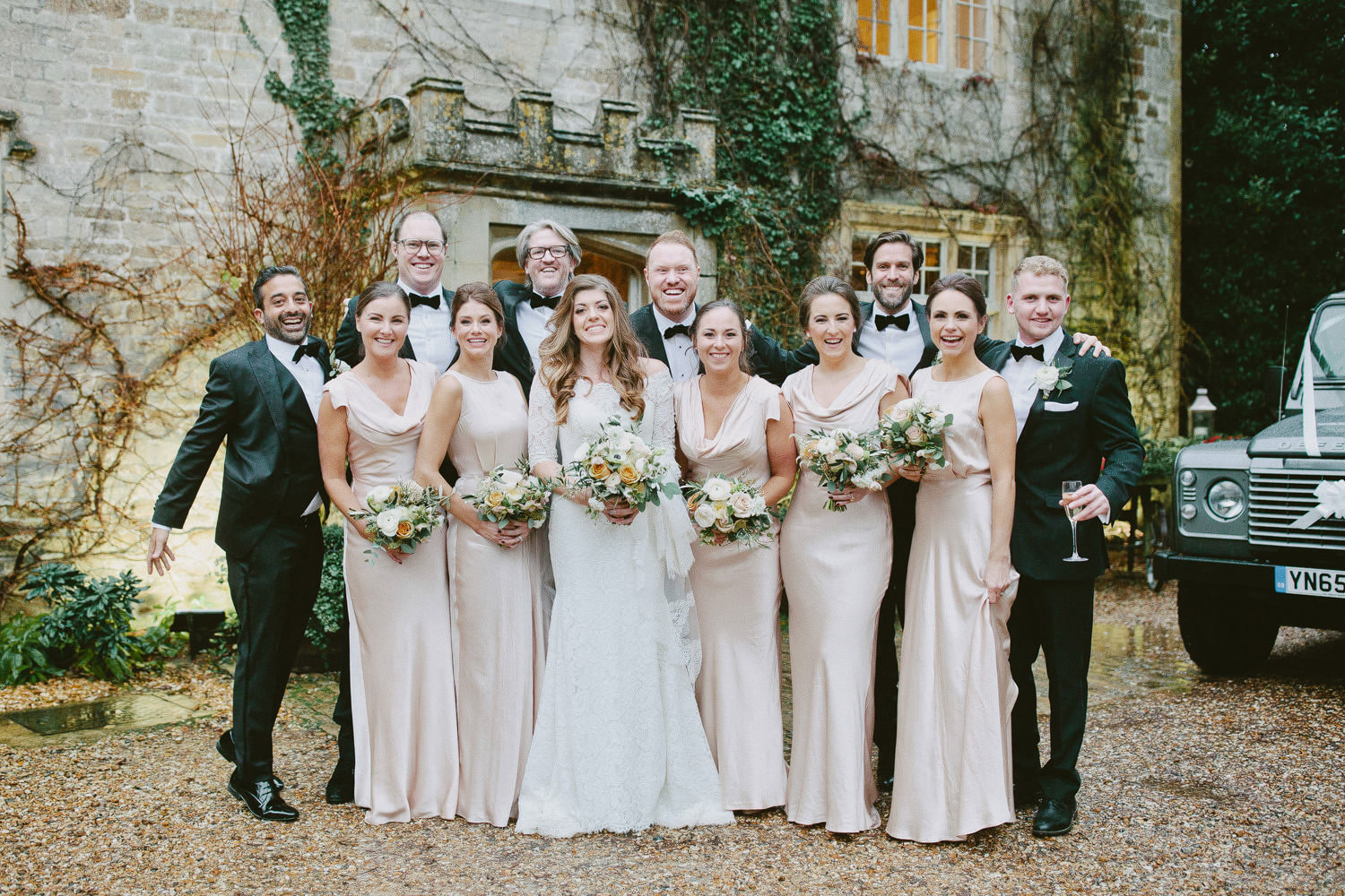 bridal party in front of Barnsley House