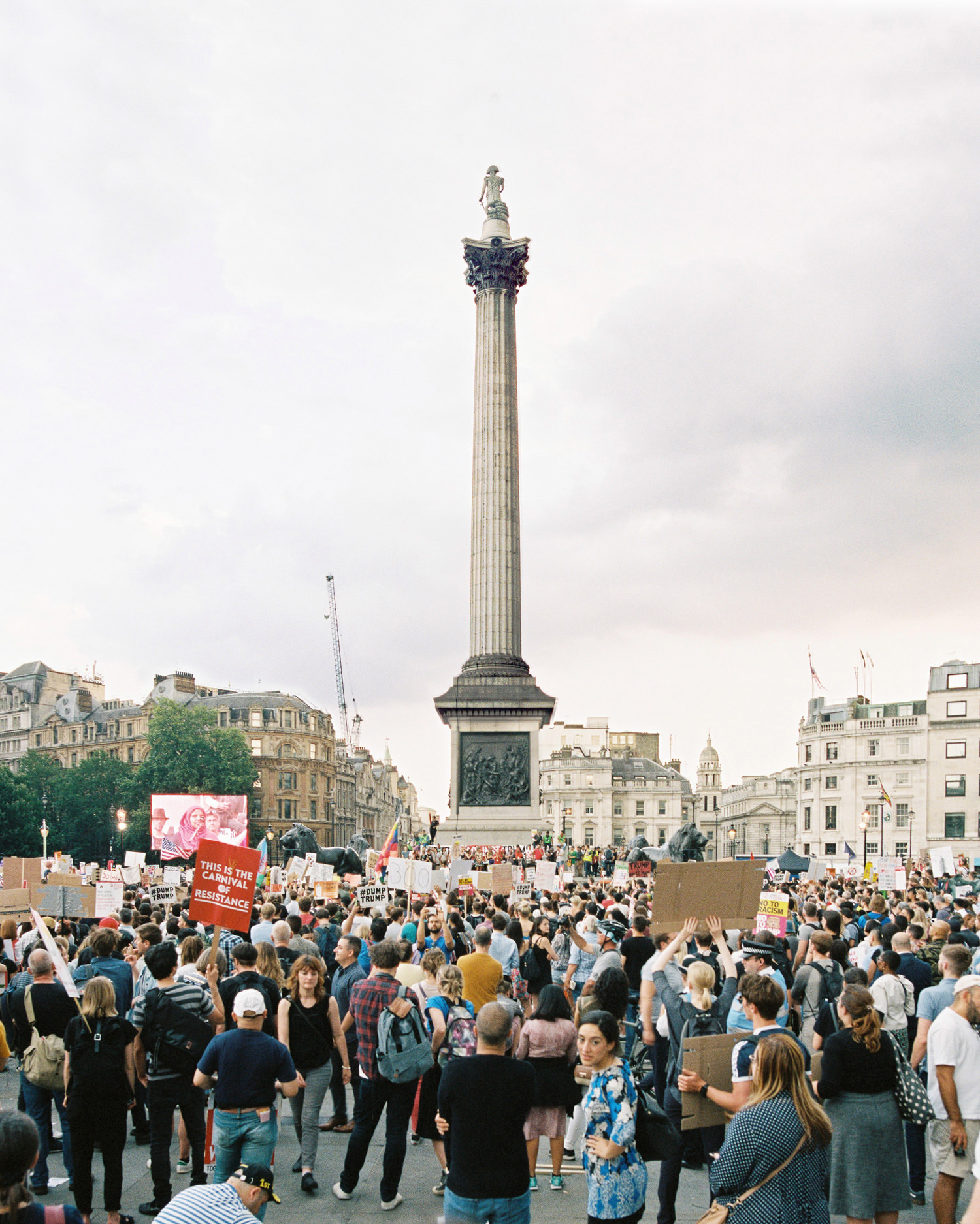 Nelsons column surrounded by protestors at London march against Trump visit