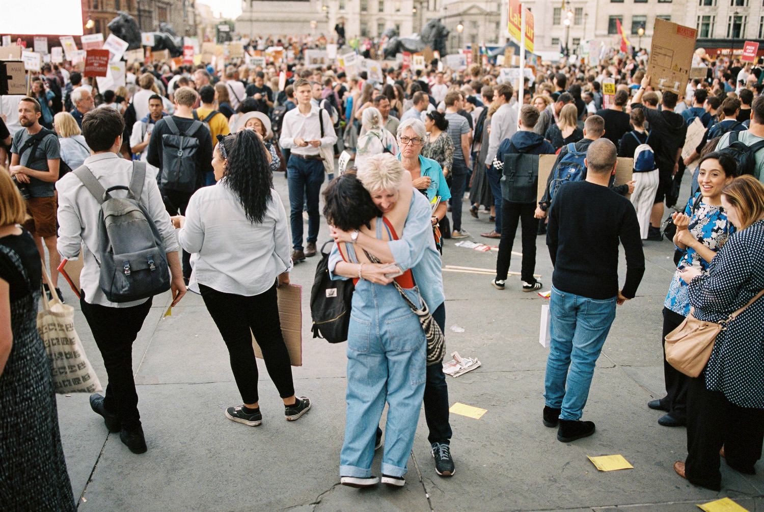 two women hugging at London protest against Donaldl Trump visit