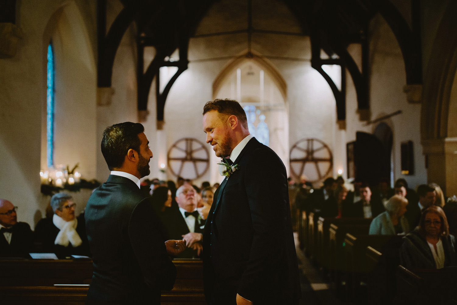 groom and best man at front of church